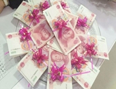 對先進個人進行現(xiàn)金獎勵，金額較大，如何進行賬務處理和稅務處理？